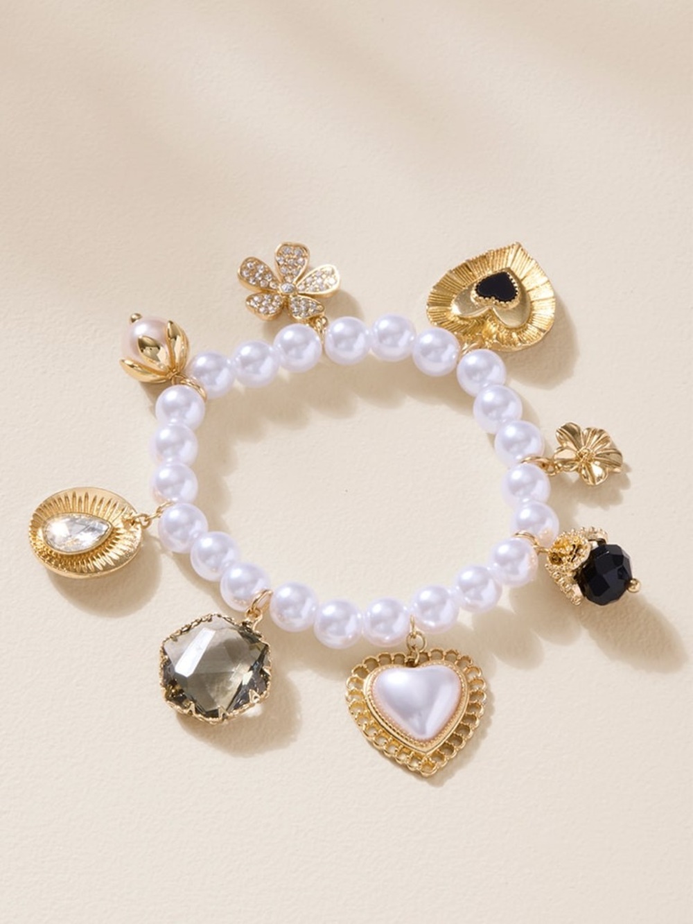 Francesca’s Mary Pearl Charm Bracelet